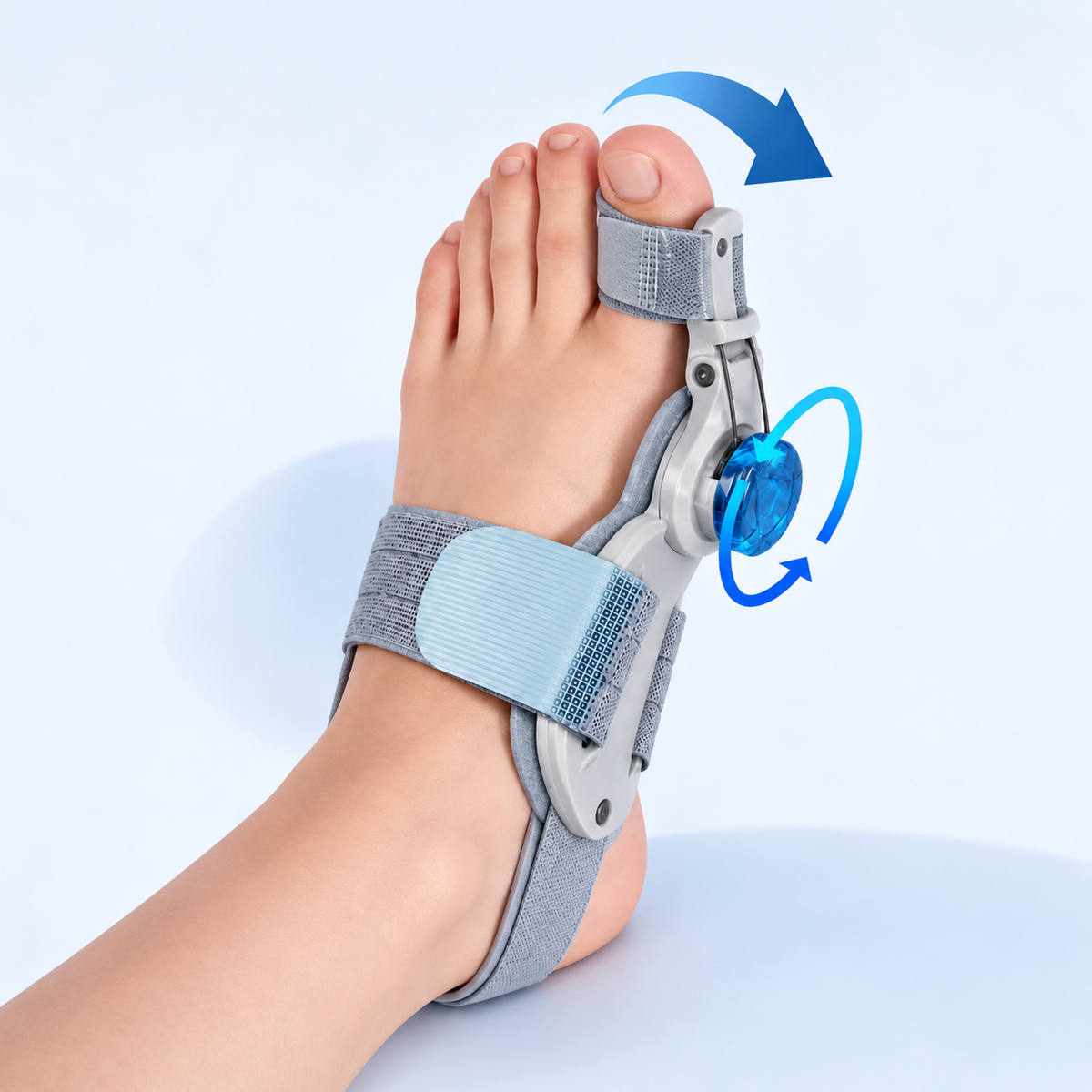 BunionRest adjustable bunion brace fitted to a bare foot, seen from the outer side, with the toe strap and the blue adjustment dial on the hinge